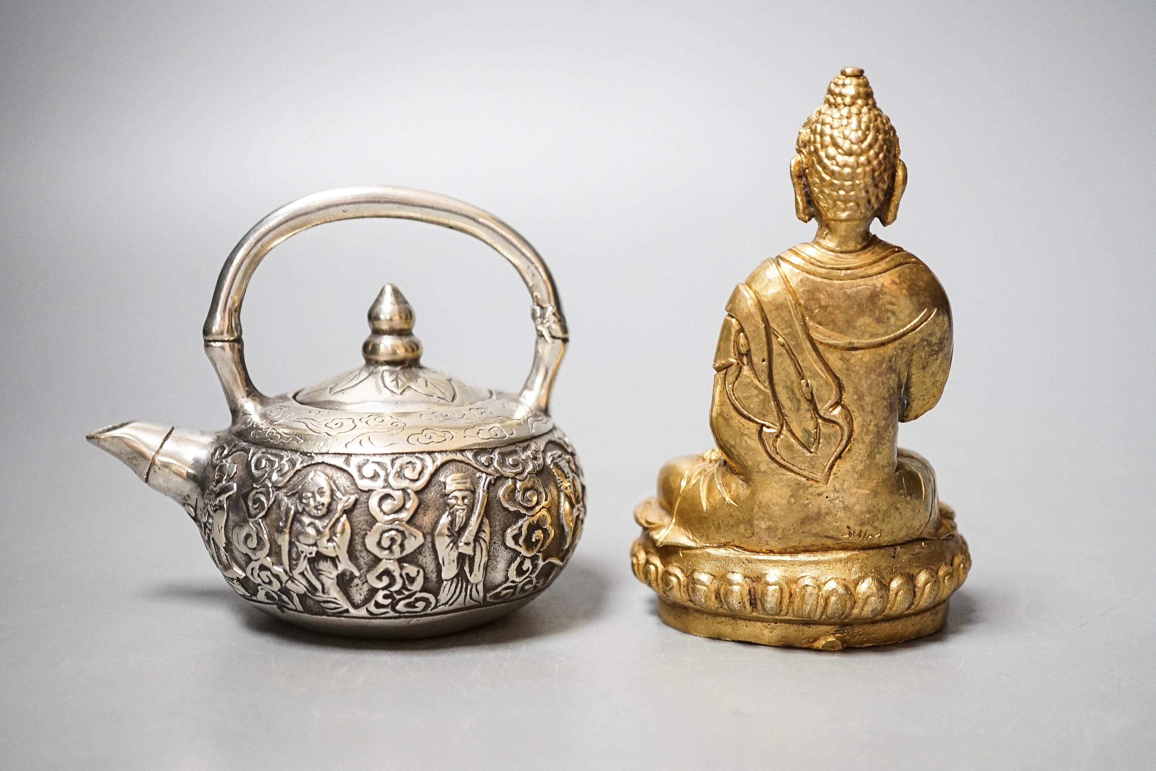 A Chinese gilt bronze buddha and a miniature plated teapot 11cm